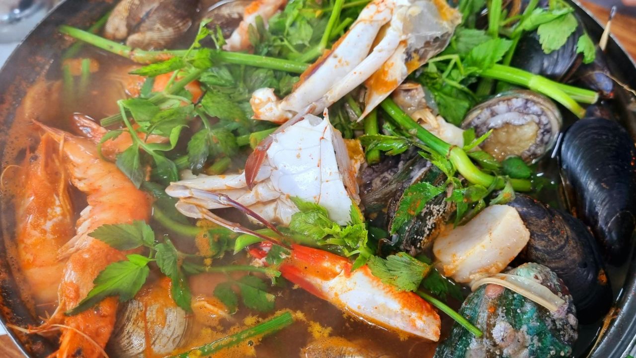 Finished Garlic Butter Crab Recipe served on a large platter.