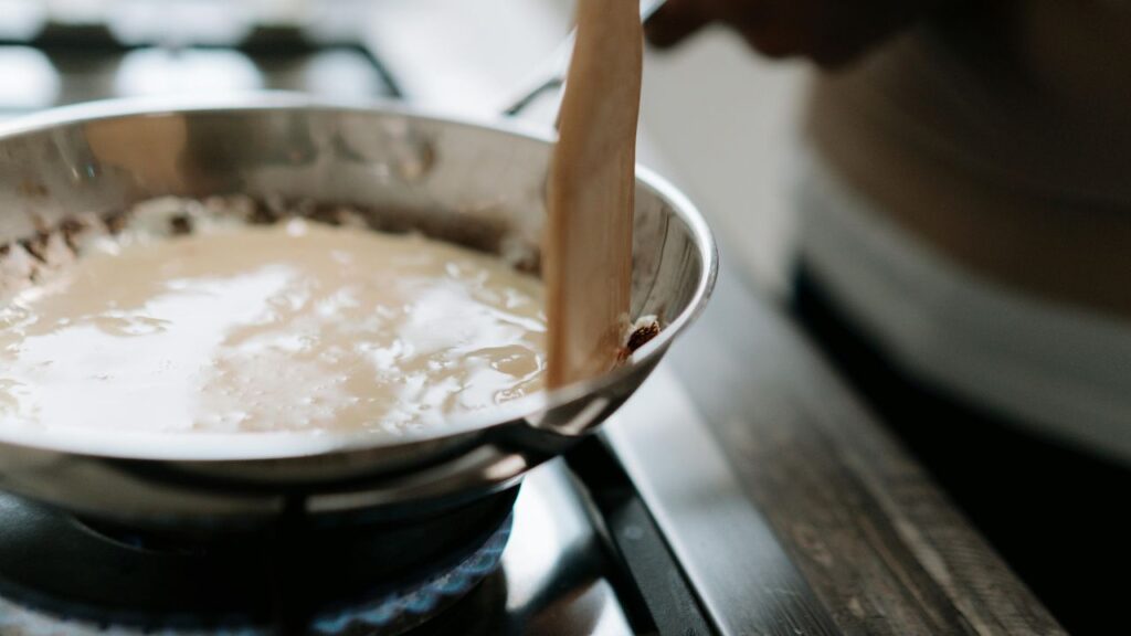 Simmering garlic butter sauce for seafood.