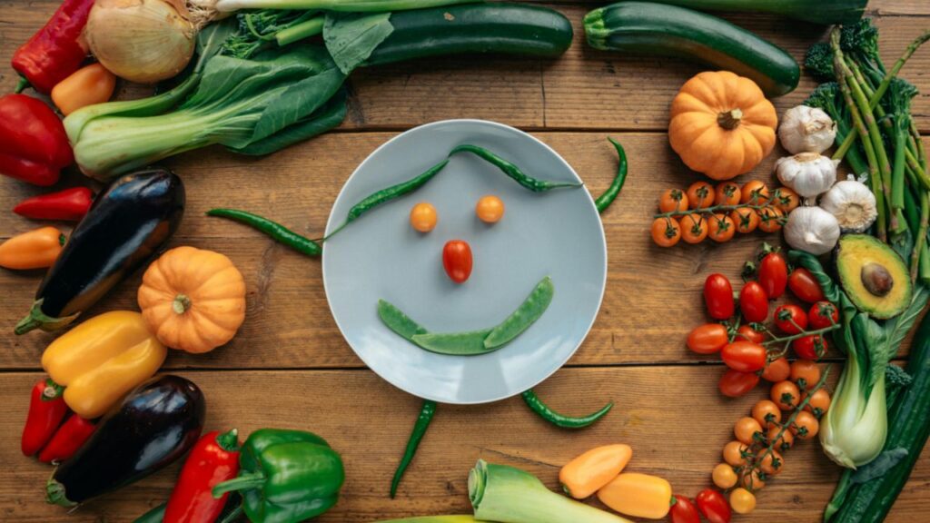 Colorful vegetable bake with zucchini and tomatoes arranged in a spiral.