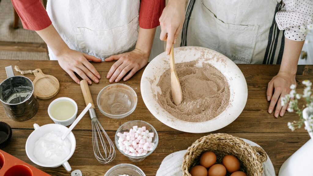 Whisk mixing cocoa powder and brown sugar into chocolate milk